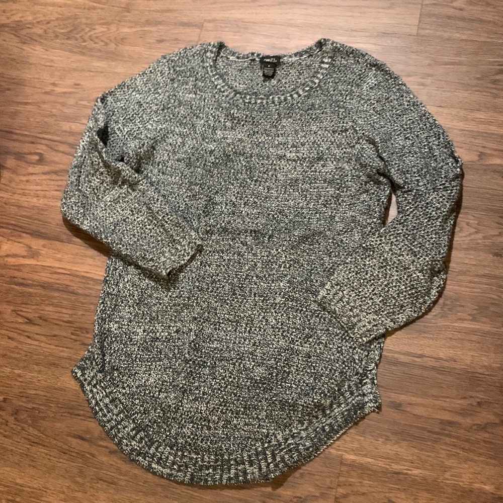 sweater. Size medium. Gently worn. No flaws.